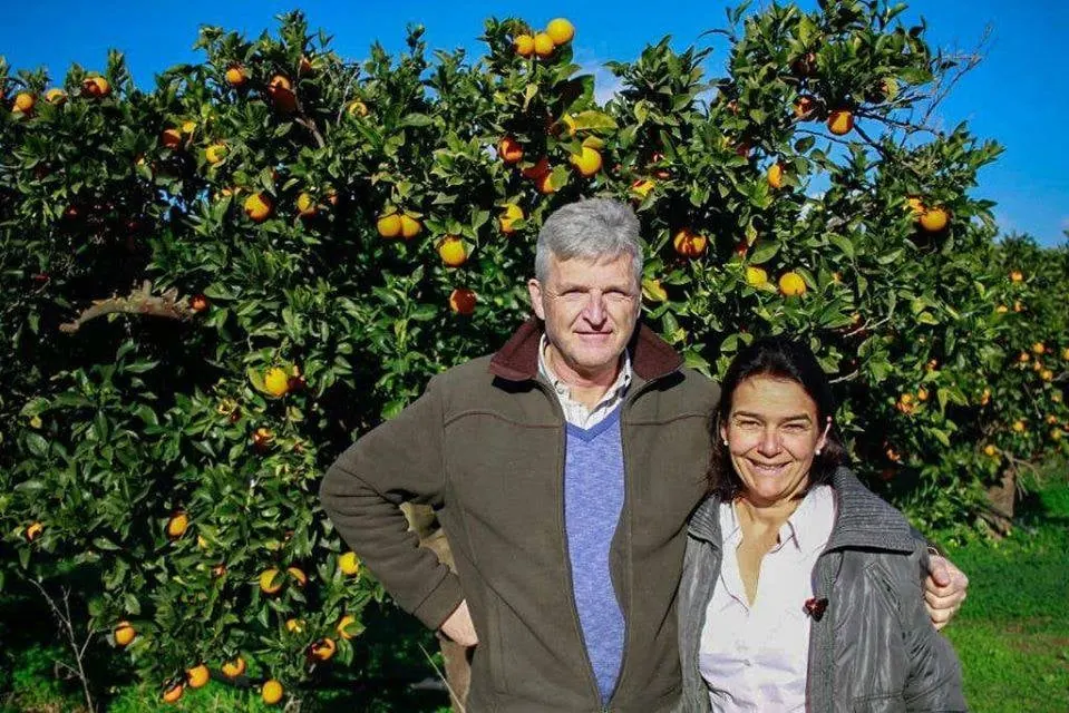 Emmanuel and Anne-Caroline Cattoir in the orchard